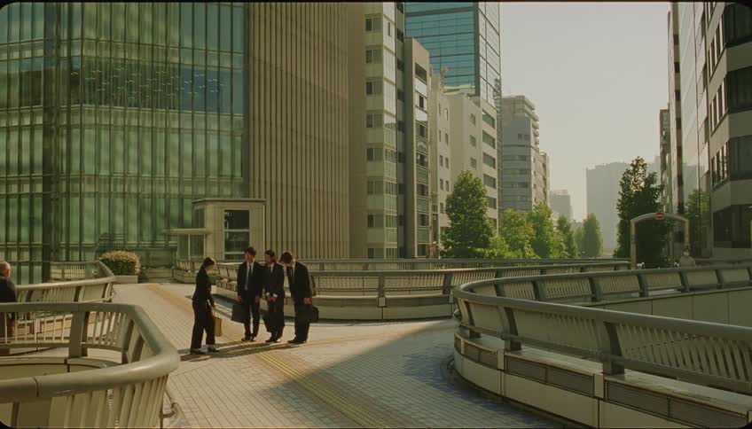 People meet in the middle of the city and walk off