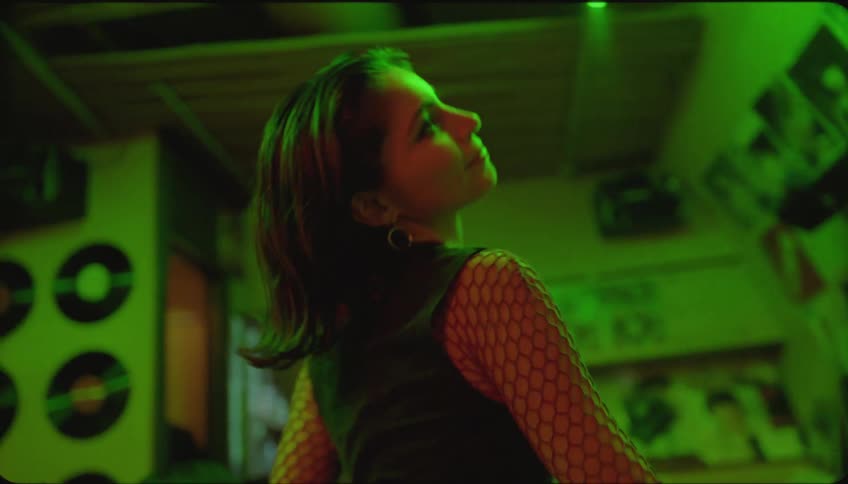 Friends singing karaoke at a club