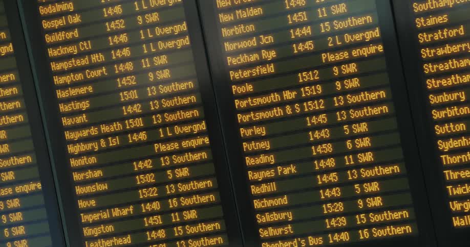 Closeup of screen displays showing airplane departure records