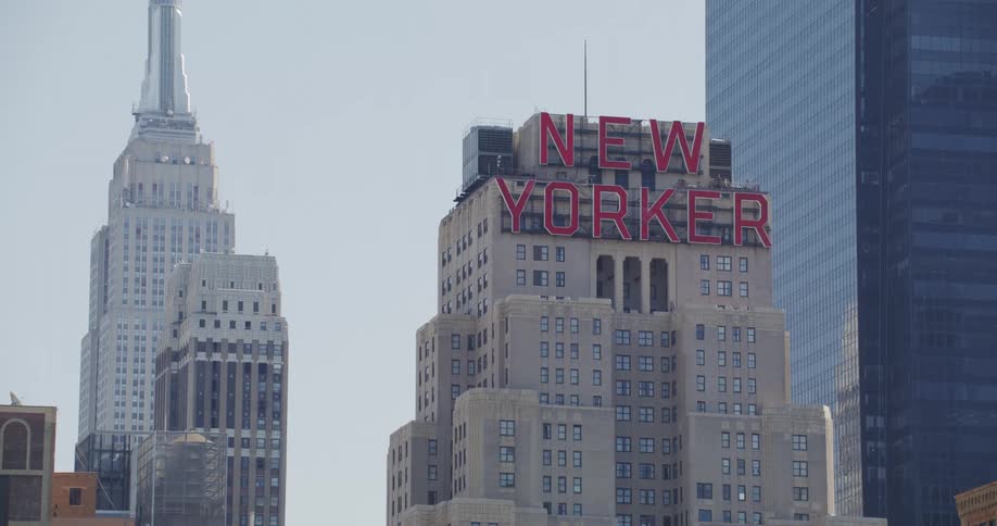 A sign reading new york on top of a commercial building