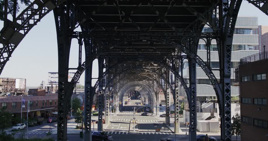 Traffic runs under the overpass in the city