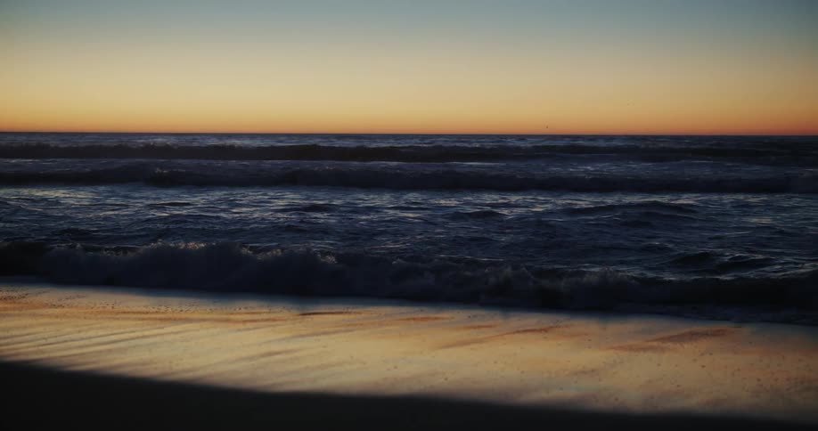 Beach with gentle waves in the early morning
