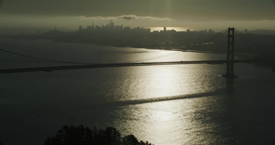 Landscape of the golden gate bridge and cityscape at sunset