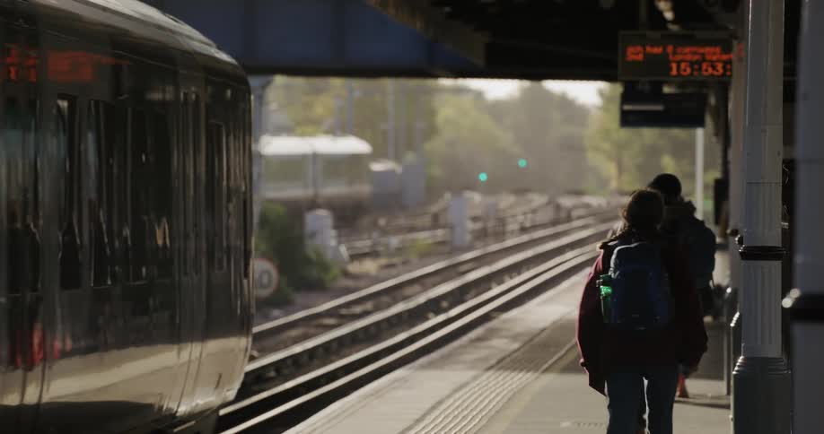 Group of people walking on a train station