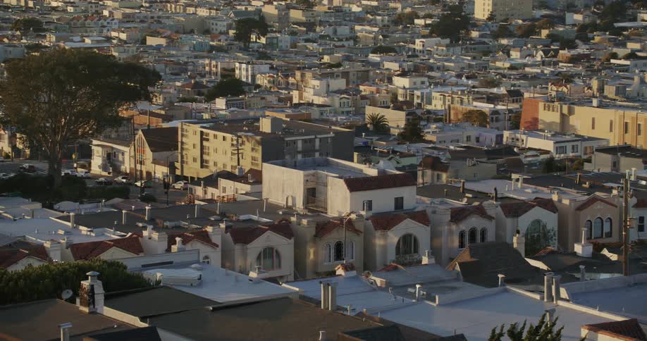 Panoramic view of a residential city with the morning suns reflection