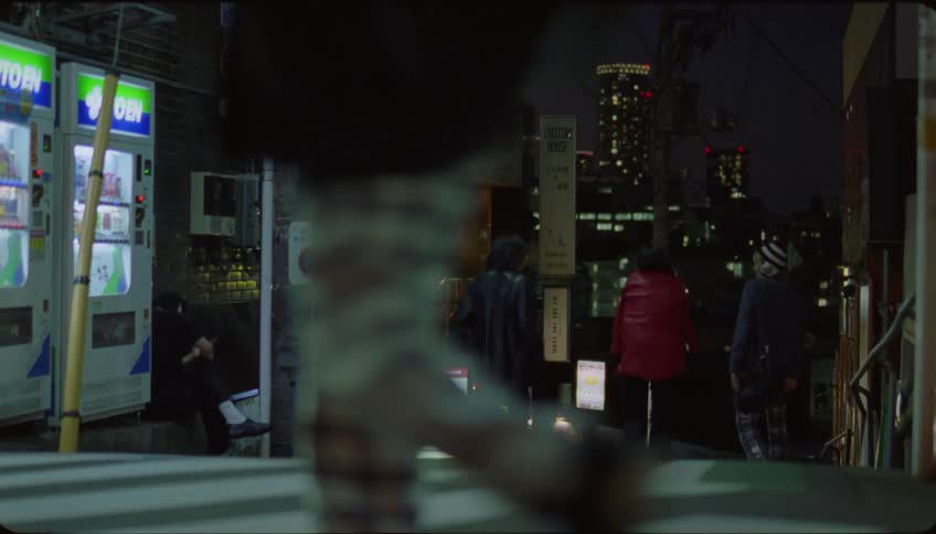 Friends walking on the city at night