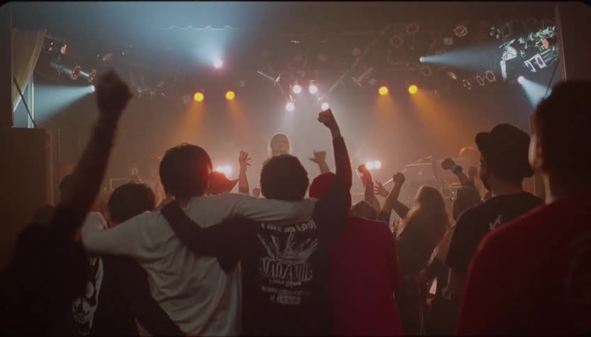 Band performs on stage at concert