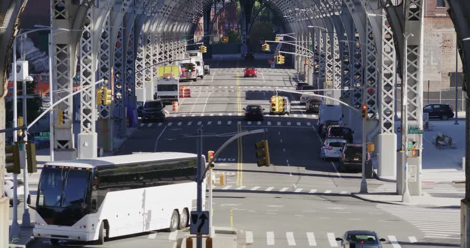 Vehicles travel under the overpass