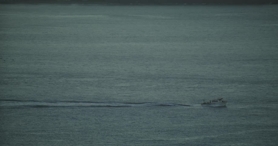 Aerial view of boat floating on the water