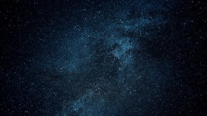 The stars of the milky way glow in the night sky