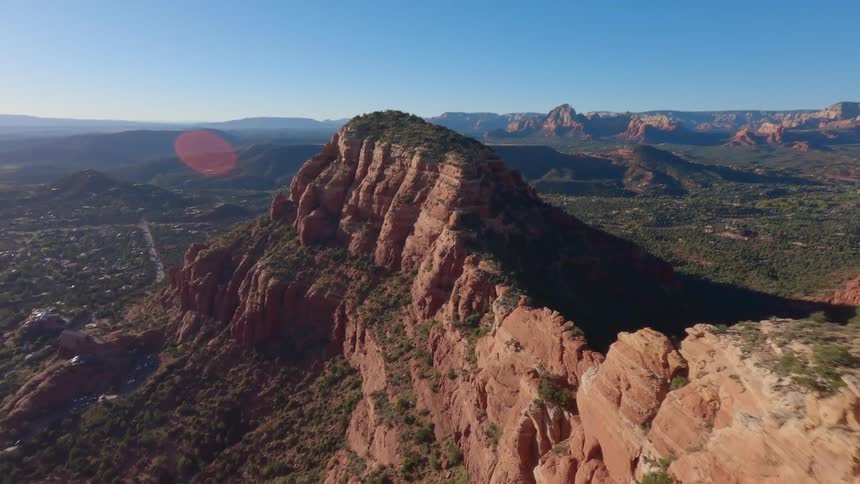 The peak of a tall rock formation