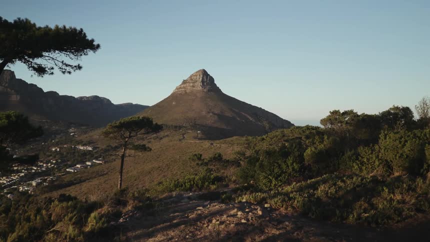 The hill is covered with shadow from trees