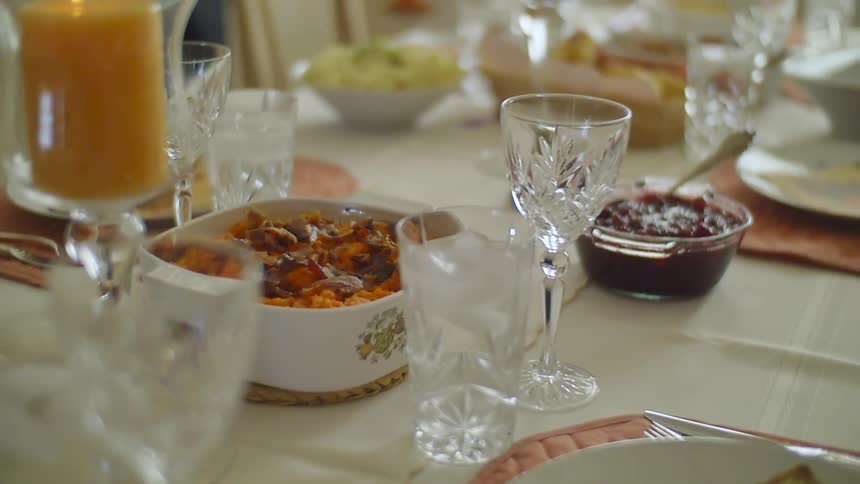 The table is set with food and drinks