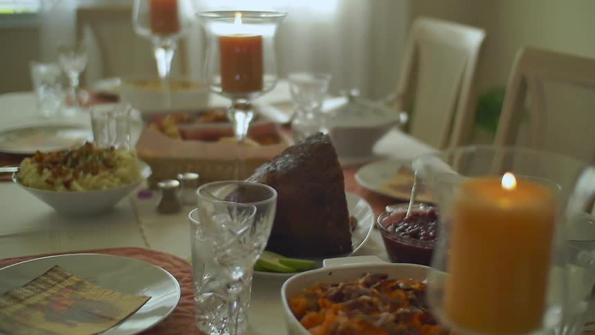 A food is set with candles and food