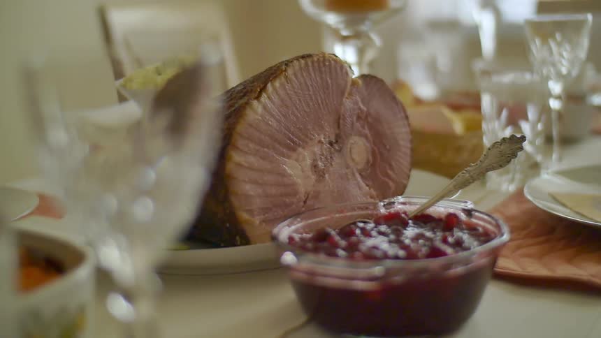 A table is set with food and glasses