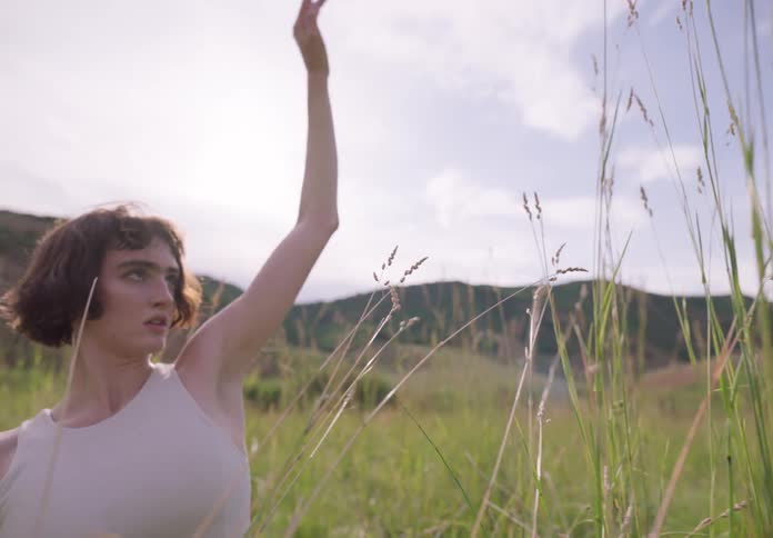 Woman in the midst of nature in a scenic performance