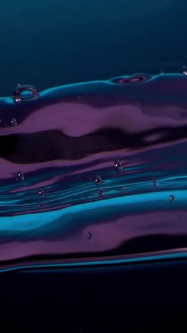 Blue and purple neon fluid liquid wave