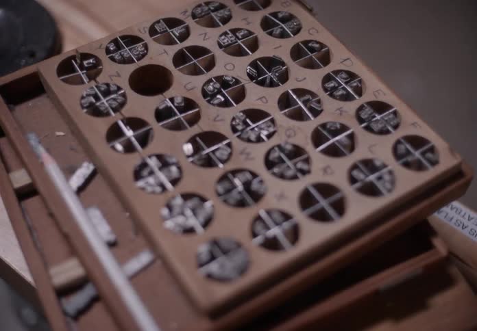 Closeup of a wooden box with utensils