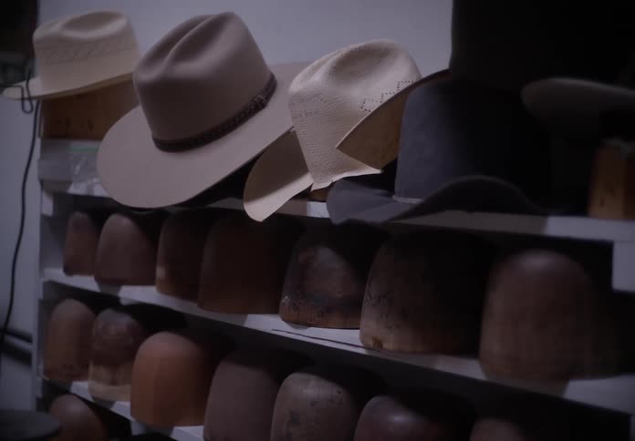Cowboy hats on a milliner or hatter workshop
