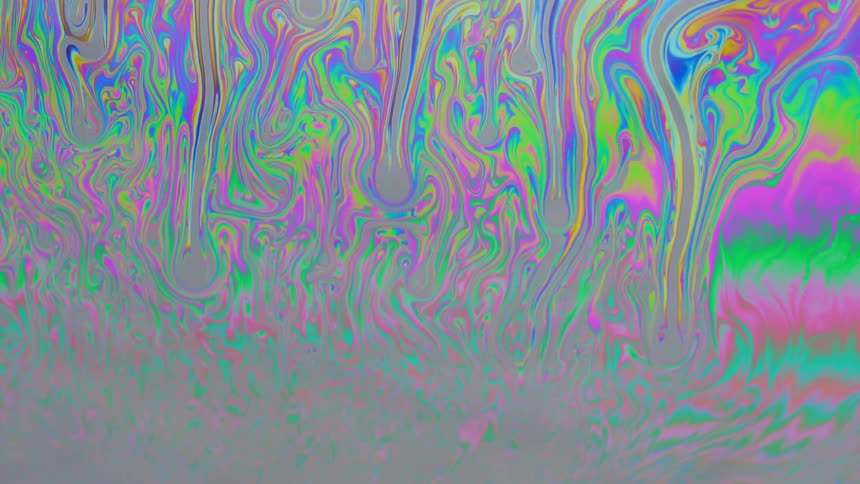 Psychedelic abstract art display of colorful waves and blobs of ink