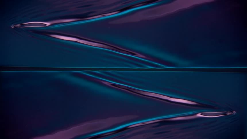The neon water moves in opposite directions