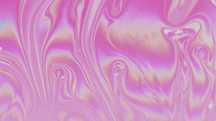 Abstract and psychedelic pink fluid in slow motion
