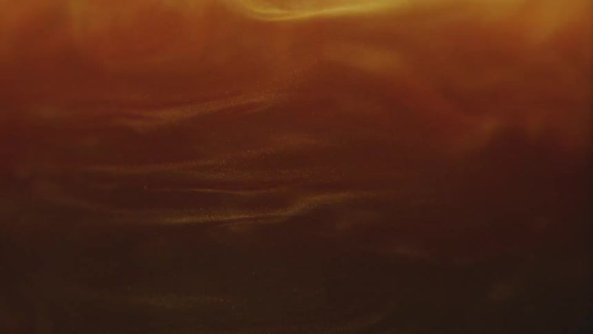 Dense and brown abstract smoke in slow motion