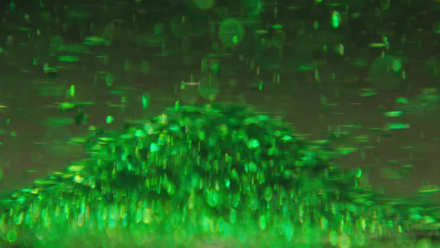Several green objects and some of them are moving