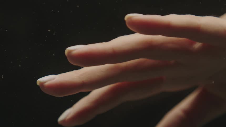 Extreme closeup of a woman hand in motion