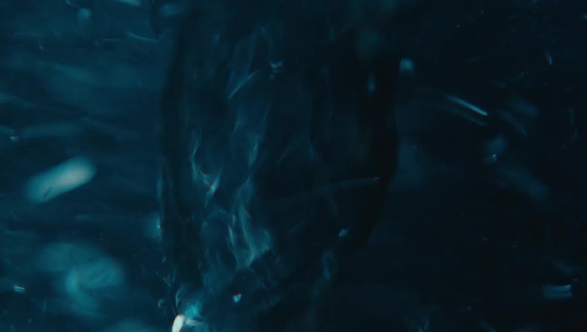 Closeup of a rapidly moving and abstract spiral underwater