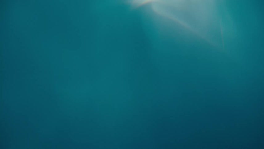 Abstract motion underwater with reflections