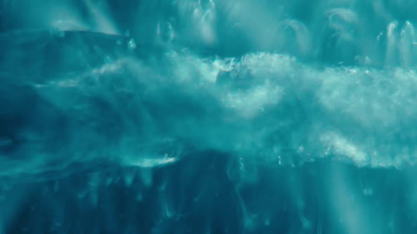 A blue liquid that is spinning