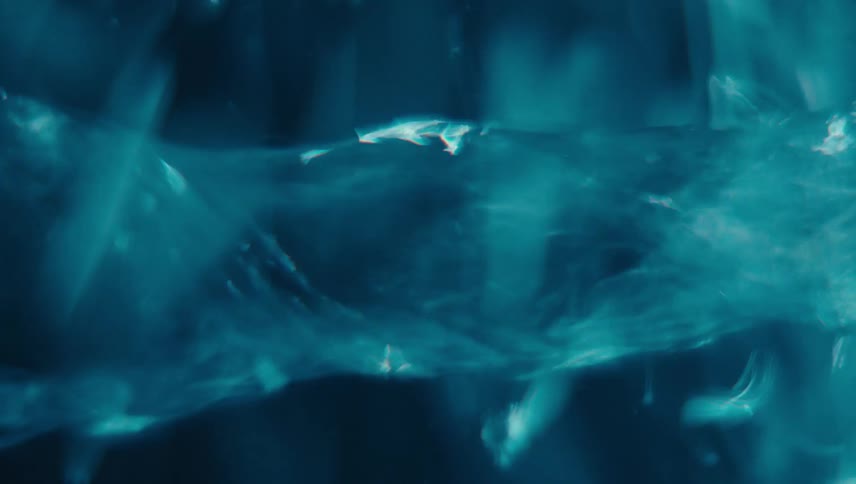 Fluid art of a tornado in blue water