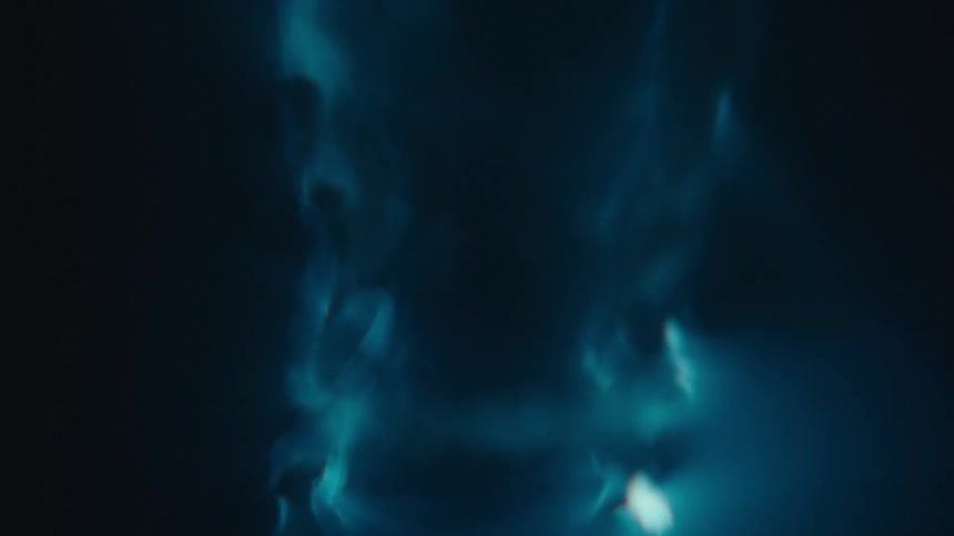 Close up of swirling clear water against a black background