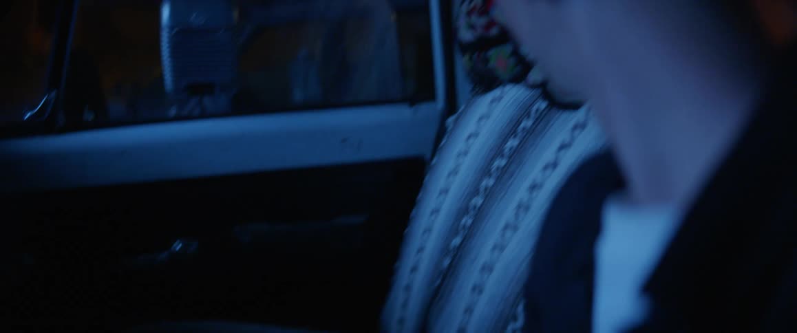 Close up of man weeping bitterly in a car