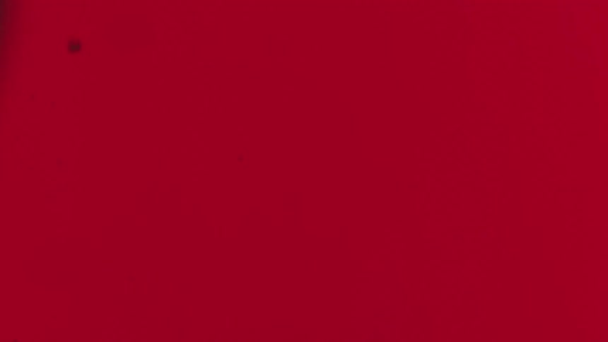 Abstract red glitter droplets