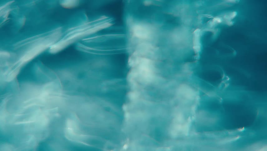 A water funnel forms as the liquid spins around very rapidly