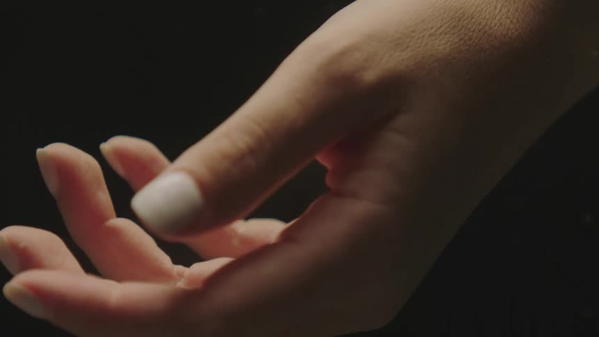 Extreme closeup of a womans hand