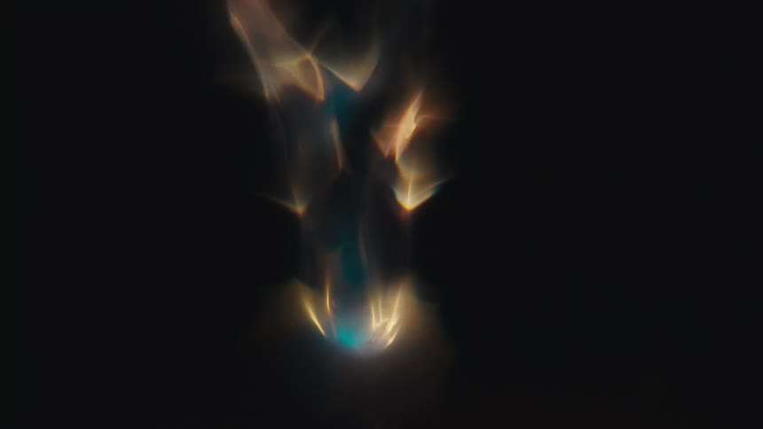 Close up of swirling clear water against a black background
