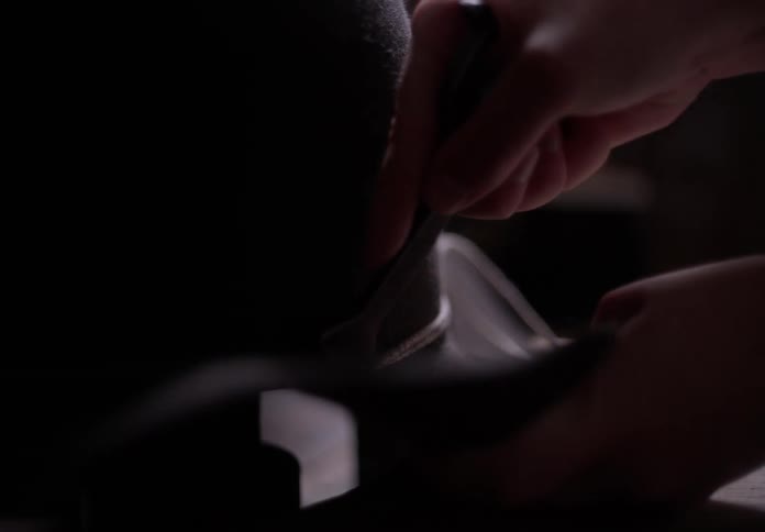 Man handcrafting a cowboy hat
