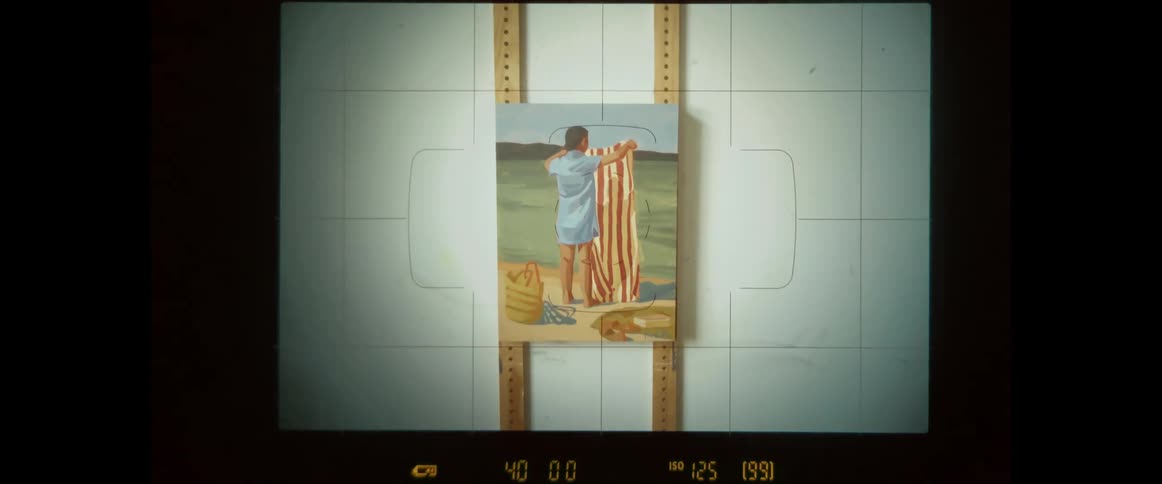 Camera view taking photos of an art canvas