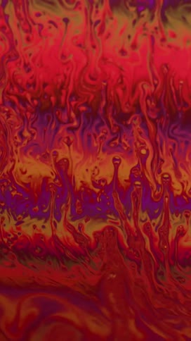Psychedelic abstract art display of colorful waves and blobs of ink