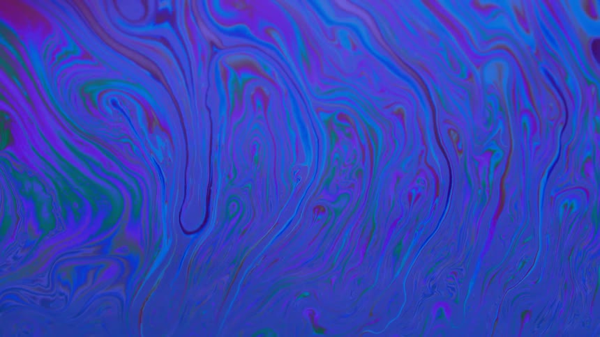 Extreme closeup of blue abstract and psychedelic art in motion