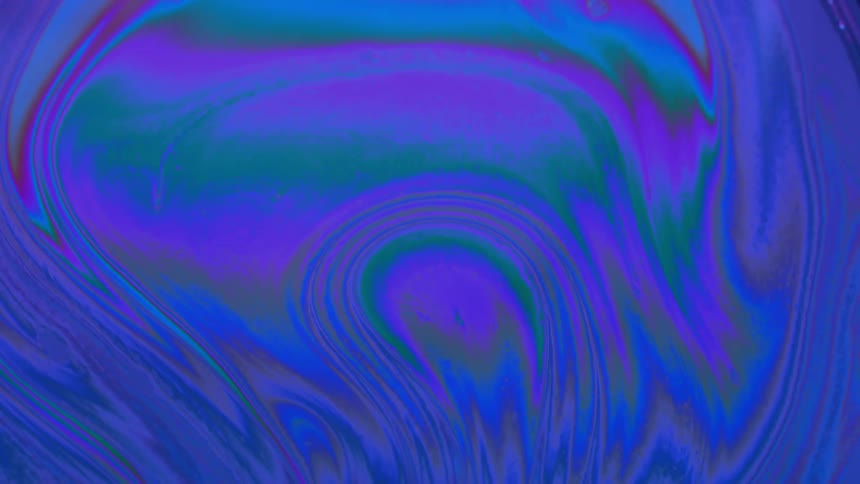 Dense and psychedelic electric blue liquid in abstract motion