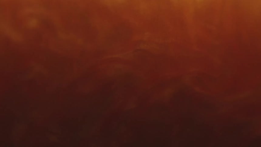 Fluid art of fire and smoke during sunset