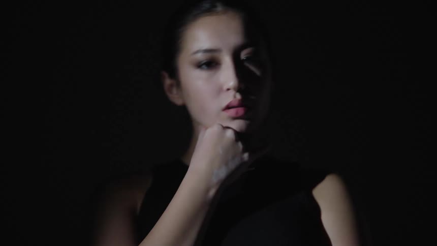 A model poses under the flashing lights