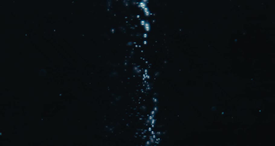 Spiral underwater with abstract bubbles in slow motion