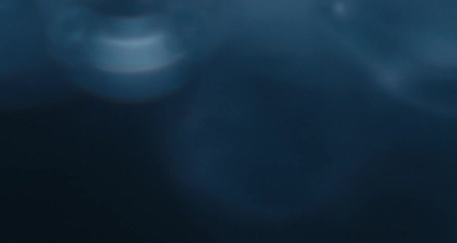 Extreme closeup underwater with abstract bubbles in motion