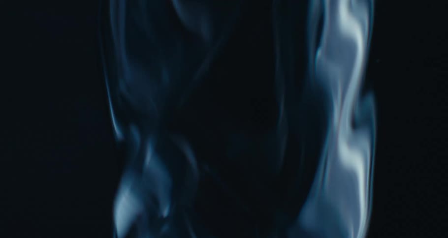 Extreme closeup of a spiral underwater in slow motion