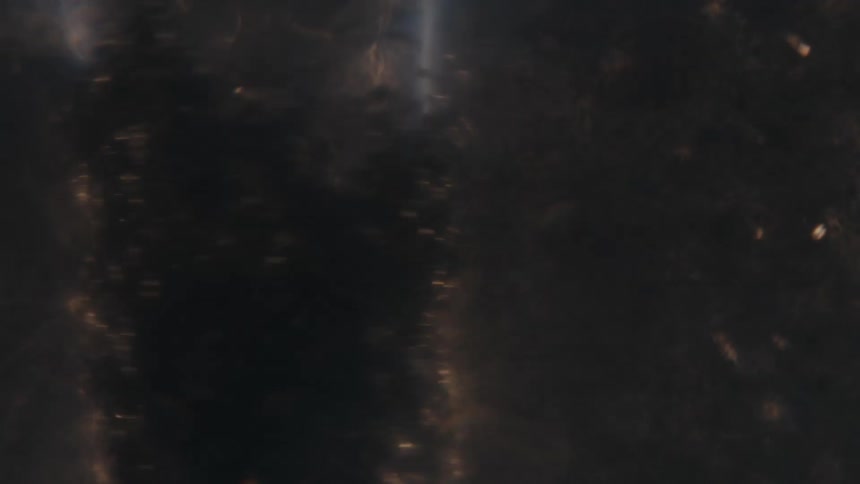 Close up of fire contained inside swirling clear water